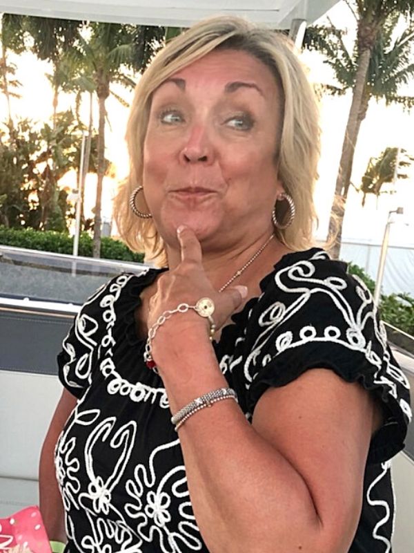 wearing a coin bracelet on a boat